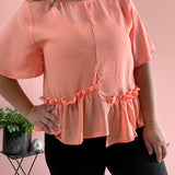 Orange ruffle detail top