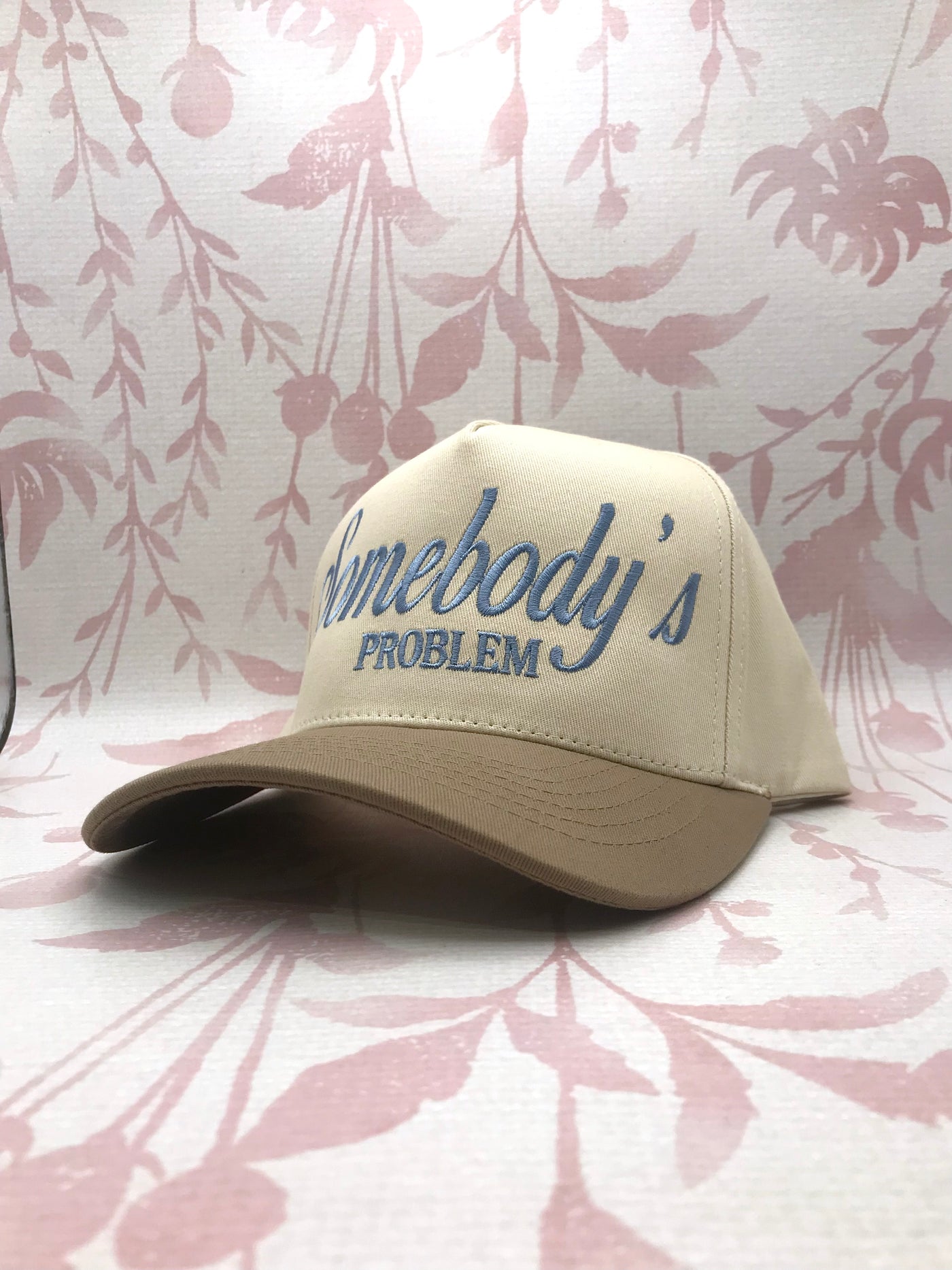 Somebody's Problem Embroidered Trucker Hat