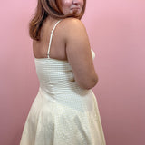 Woman wearing yellow Gingham Mini Dress