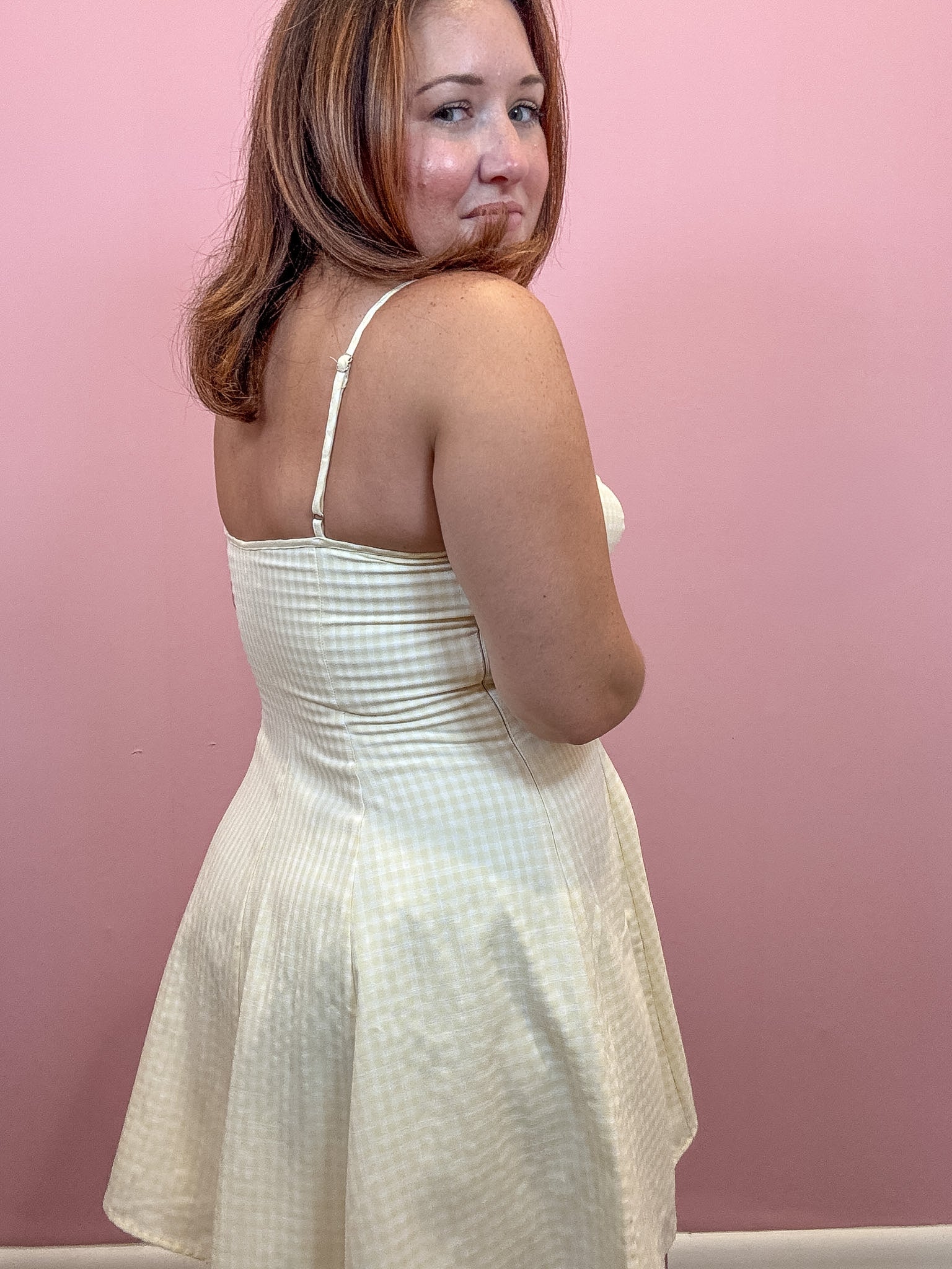 Woman wearing yellow Gingham Mini Dress
