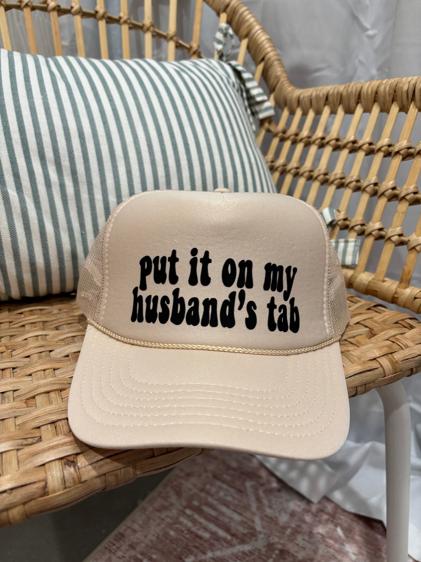 Put It On My Husbands Tab Trucker Hat