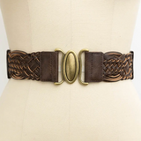 A dark brown braided leather belt with a central brass oval buckle, displayed on a cream-colored dress form.